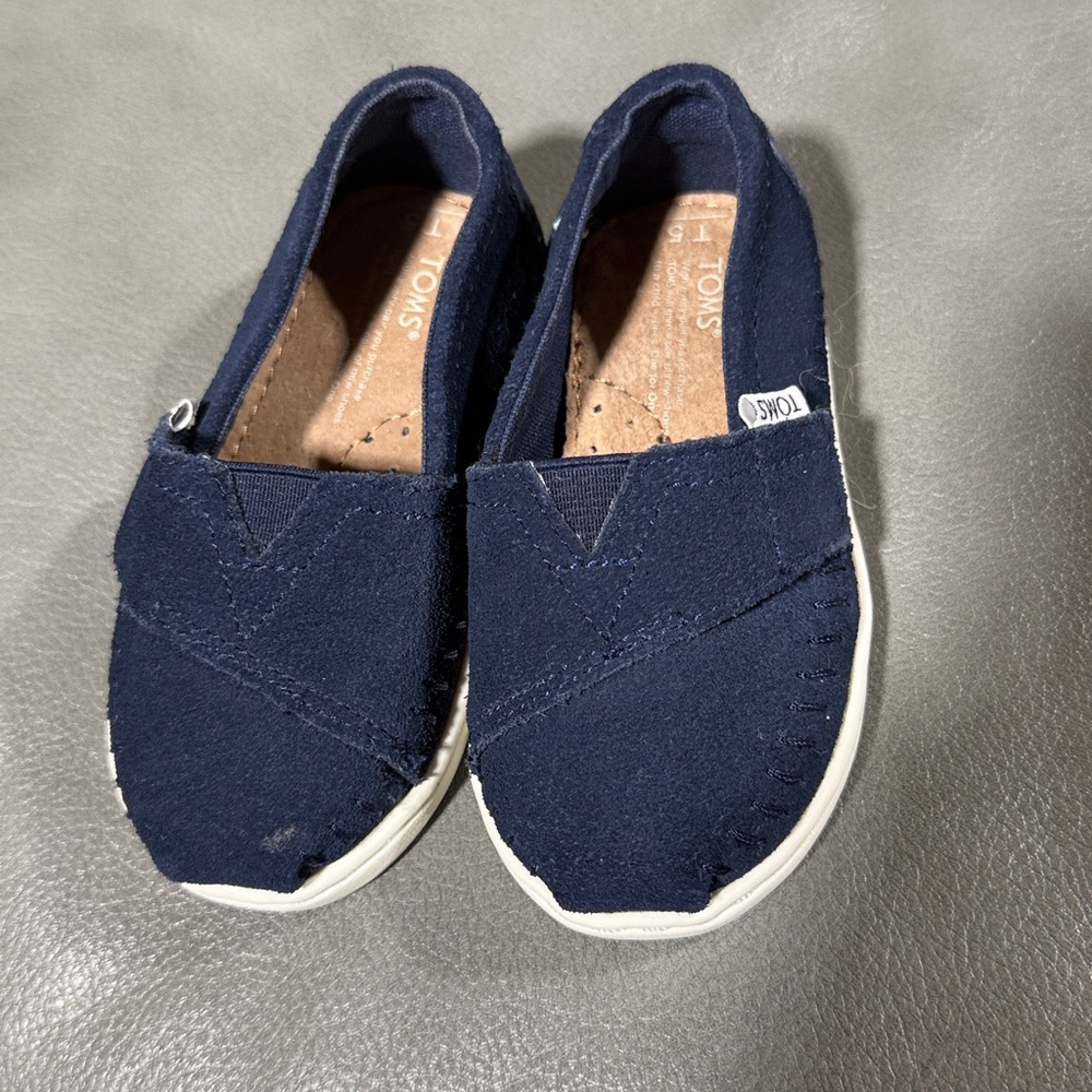Tom’s baby shoes